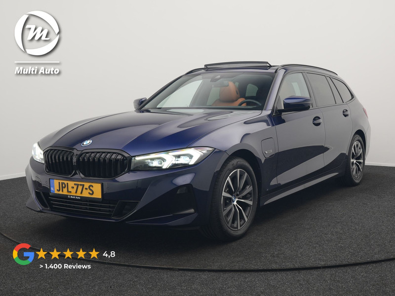 BMW 3-serie Touring 320e Plug In Hybrid 204pk Dealer O.H. PHEV | Panodak | Widescreen Navi | Camera | Lederen Sportstoelen Verwarmd | Sfeerverlichting | Apple Carplay | Navigatie | Virtual | DAB | Tansanitblau II Metallic |