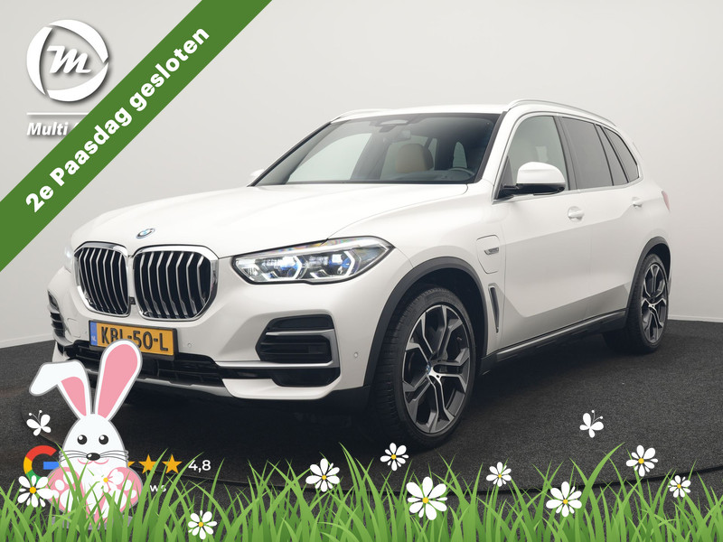 BMW X5 xDrive45e X Line PHEV 395pk Dealer O.H. | Trekhaak Af Fabriek | Luchtvering | Adaptive Cruise | Head Up | 360 Camera | Adaptief Onderstel | Laser LED | Lederen Sportstoelen Memory & Verwarmd | Sfeerverlichting | Keyless | Plug In H