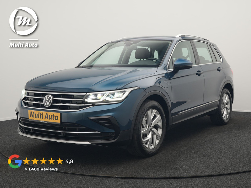 Volkswagen Tiguan 1.4 TSI eHybrid Elegance PHEV 245pk Dealer O.H. | Trekhaak Af Fabriek | Adaptive Cruise | IQ Light | Camera | Lederen Comfortzetels Memory & Verwarmd | Sfeerverlichting | Apple Carplay | Stuur Verwarmd | Navigatie | DAB | Plug In Hybrid |