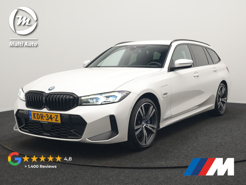 BMW 3-serie Touring 330e M Sport PHEV 293pk Dealer O.H. NIEUW MODEL | Adaptive Cruise | Head Up | Camera | Lederen Competition Stoelen Memory & Verwarmd | Sfeerverlichting | Stuur Verwarmd | Keyless | Blis | Apple Carplay | Plug In Hybrid |