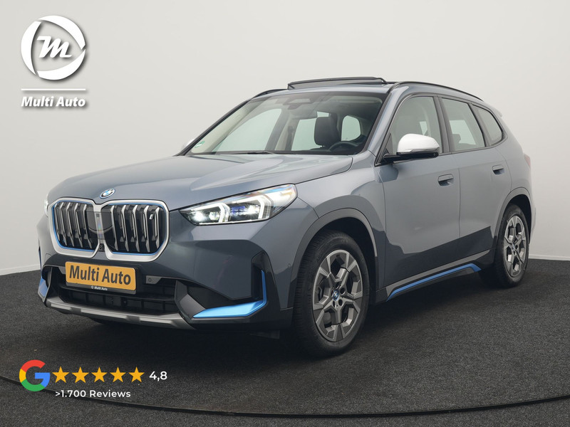 BMW iX1 xDrive30 Launch Edition 313pk Dealer O.H | Panodak | Adaptive Cruise | 360 Camera | Lederen Comfortzetels Massage & Memory | Head Up | Harman Kardon | Keyless |