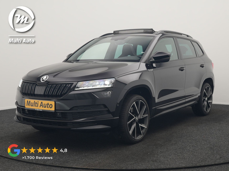 Škoda Karoq 1.5 TSI ACT Sportline 150pk DSG Dealer O.H | Trekhaak Afn. | Panodak | RS Sportstoelen Verwarmd | Adaptive Cruise | Sfeerverlichting | Camera | Apple Carplay | Keyless | Navigatie | DAB | 19" L.M |
