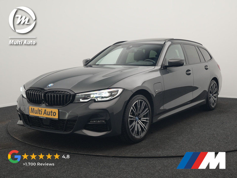 BMW 3-serie Touring 330e M Sport 293pk Dealer O.H. Dravitgrau | Panodak | Adaptive Cruise | Camera | Lederen Sportstoelen Memory & Verwarmd | Sfeerverlichting | Stuur Verwarmd | Hifi Audio | Blis | Keyless | Apple Carplay | Plug In Hybrid |