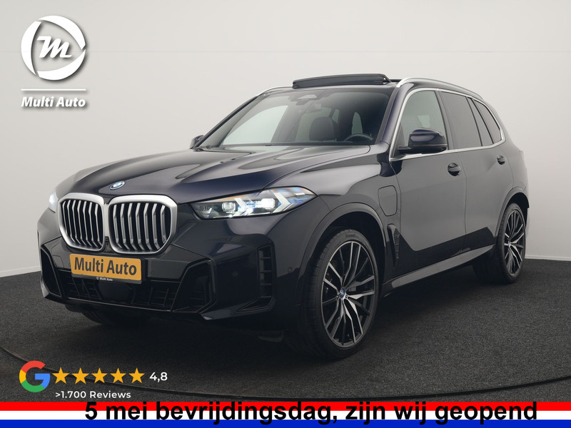 BMW X5 xDrive50e M Sport PHEV 490pk Dealer O.H. | Panodak Sky Lounge | Luchtvering | Head Up | 360 Camera | Harman / Kardon | Nappa Lederen Comfortstoelen Memory & Verwarmd | Apple Carplay | Keyless | Blis | 22"L.M | Plug In Hybrid |