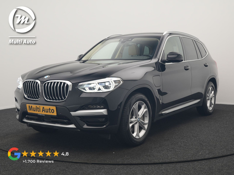 BMW X3 xDrive30e Business Edition Plus PHEV 293pk Dealer O.H. | Trekhaak Af Fabriek | Adaptive Cruise | 360 Camera | Adaptief Onderstel | Lederen Sportstoelen Memory & Ventilatie | Sfeerverlichting | Stoelen & Stuur Verwarmd | Keyless | Blis | Plug In Hybrid |