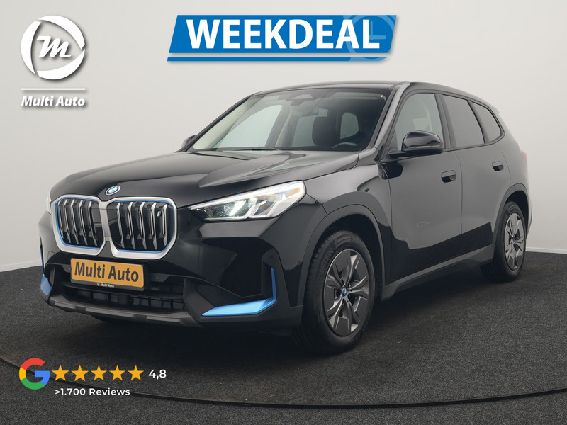 BMW iX1 xDrive30 67 kWh 313pk Dealer O.H. | Adaptief M Onderstel | Camera | Cruise Control | Stoelverwarming | Widescreen Navi | Park Assist | Apple Carplay | Navigatie | DAB | Standkachel |