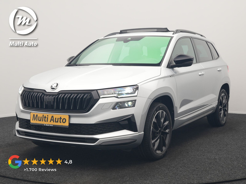 Škoda Karoq 1.5 TSI ACT Sportline Facelift Model 150pk DSG Dealer O.H | Trekhaak Af Fabriek | Adaptive Cruise | Crystal LED | Lederen Sportstoelen Memory & Verwarmd | Keyless | Sfeerverlichting | Apple Carplay | Verwarmd Sportstuur | Navigatie | Virtual | DAB |