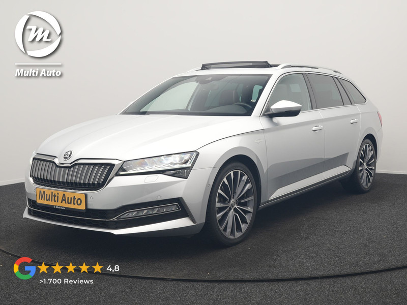 Škoda Superb Combi 1.4 TSI iV Laurin & Klement PHEV 218pk Dealer O.H. | Trekhaak Af Fabriek | Panodak | Adaptive Cruise | Camera | Lederen Comfortstoelen Memory & Ventilatie | Sfeerverlichting | Stoelen & Stuur Verwarmd | Keyless | Blis | Crystal LED | Plug In Hybrid |