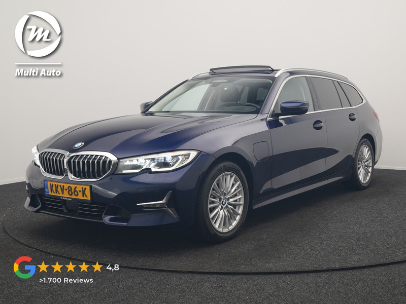 BMW 3-serie Touring 330e Luxury Line PHEV 293pk Dealer O.H. | Trekhaak Af Fabriek | Panodak | Head Up | Adaptive Cruise | Laser LED | Camera | Lederen Comfortstoelen Verwarmd | Sfeerverlichting | Keyless | Blis | Apple Carplay | Navigatie | DAB | Plug In Hybrid |