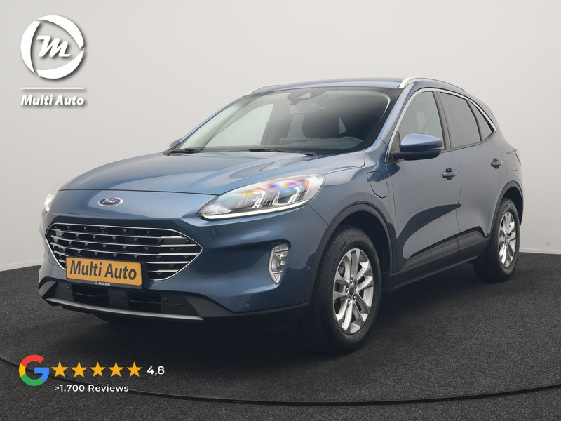 Ford Kuga 2.5 PHEV Titanium 225pk Dealer O.H | Adaptive Cruise | 360 Camera | BLIS | Stoelen & Stuur Verwarmd | Keyless | Pilot Assist | Navigatie | Apple Carplay | Virtual | DAB | 17"L.M | Plug In Hybrid |