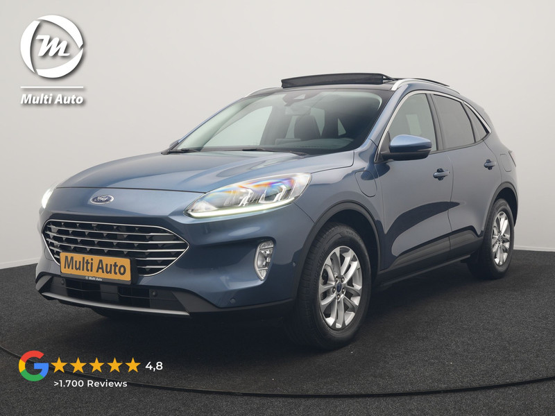 Ford Kuga 2.5 Titanium PHEV 225pk Dealer O.H. | Trekhaak Af Fabriek | Panodak | Adaptive Cruise | 360 Camera | Sportstoelen & Stuur Verwarmd | Keyless | Blis | Apple Carplay | Navigatie | DAB | Plug In Hybrid |