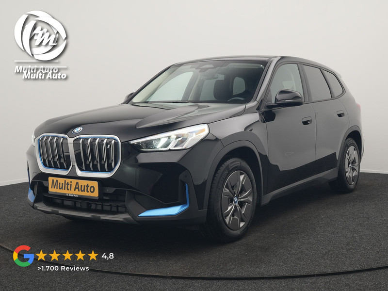BMW iX1 xDrive30 67 kWh 313pk Dealer O.H. | Adaptief M Onderstel | Camera | Cruise Control | Stoelverwarming | Widescreen Navi | Park Assist | Apple Carplay | Navigatie | DAB | Standkachel |