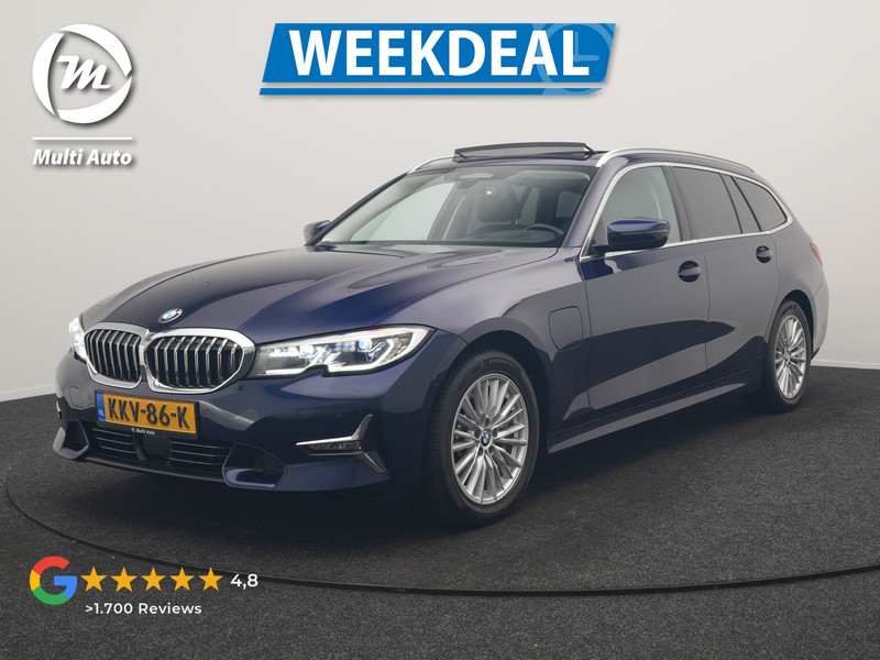 BMW 3-serie Touring 330e Luxury Line PHEV 293pk Dealer O.H. SOH 88,8% | Trekhaak Af Fabriek | Panodak | Head Up | Adaptive Cruise | Laser LED | Camera | Lederen Comfortstoelen Verwarmd | Sfeerverlichting | Keyless | Blis | Apple Carplay | Navigatie | DAB | Plug In Hybrid |