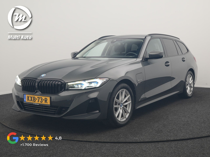 BMW 3-serie Touring 320e Facelift 204pk PHEV Dealer O.H. | Dravitgrau metallic | Head Up | Camera | Widescreen Navi | Stoelverwarming | Apple Carplay | Blis | Adaptive LED | Park Assist | DAB | Plug In Hybrid |