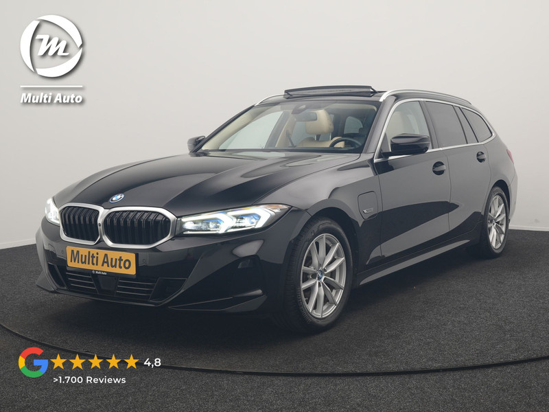 BMW 3-serie Touring 320e Luxury Line Facelift PHEV Dealer O.H. | Trekhaak Af Fabriek | Panodak | Head Up | Adaptive Cruise | 360 Camera | Lederen Sportstoelen Verwarmd | Sfeerverlichting | Apple Carplay | Keyless | Widescreen Navi | DAB | Plug In Hybrid 