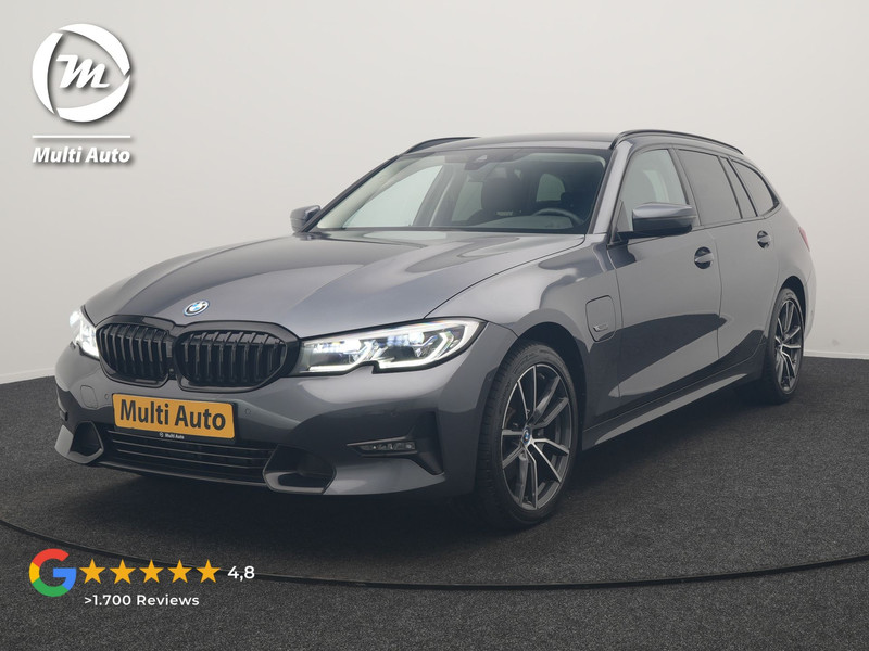 BMW 3-serie Touring 320e xDrive Sportline PHEV 204pk Dealer O.H | Trekhaak Af Fabriek | Camera | Laser LED | Cruise Control | Lederen Sportstoelen Verwarmd | Keyless | Sfeerverlichting | Apple Carplay | BLIS | Virtual | Navigatie | DAB | 18"L.M | Plug In Hybrid |