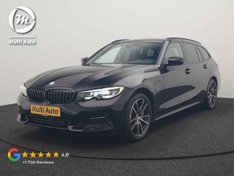 BMW 3-serie Touring 330e xDrive Sportline PHEV 293pk Dealer O.H | SOH 87,9% | Trekhaak Af Fabriek | Camera | Lederen Sportstoelen Verwarmd | Apple Carplay | Sfeerverlichting | Navigatie | Virtual | Cruise Control | DAB | 18"L.M | Plug In Hybrid |