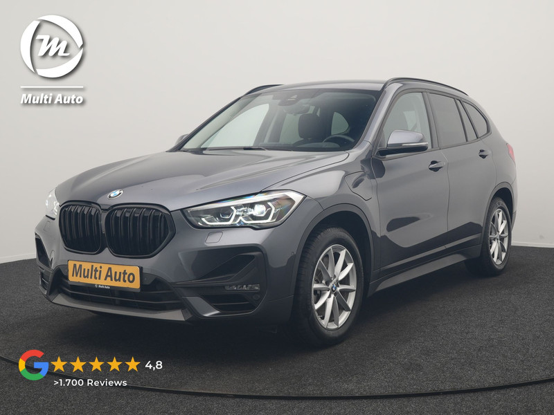 BMW X1 xDrive25e Advantage PHEV 221pk Dealer O.H | SOH 87,9% | Trekhaak Afn. | Adaptive Cruise | Head Up | Camera | Sportstoelen Memory & Verwarmd | Stuur Verwarmd | Sfeerverlichting | Navigatie | DAB | 17"L.M | Plug In Hybrid |