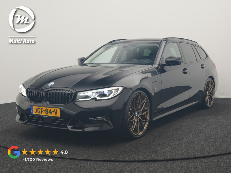 BMW 3-serie Touring 330e Sportline PHEV 293pk Dealer O.H. | SOH 86,2% | Trekhaak Af Fabriek | Head Up | Adaptive Cruise | Laser LED | 360 Camera | Lederen Sportstoelen Memory & Verwarmd | Stuur Verwarmd | Keyless | BLIS | Sfeerverlichting | Apple Ca