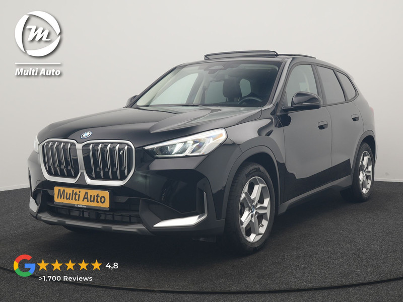 BMW iX1 xDrive30 67 kWh 313pk Dealer O.H | SOH 94,7% | Panodak | Camera | Stoelen Massage & Verwarmd | Blis | Apple Carplay | Cruise Control | DAB | Navigatie | Virtual | 18"L.M |