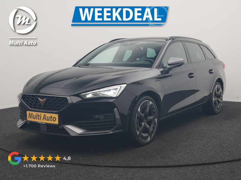 CUPRA Leon Sportstourer 1.4 e-Hybrid VZ PHEV 245pk Dealer O.H | SOH 86,3% | Trekhaak Af Fabriek | Camera | Sfeerverlichting | Sportstoelen & Stuur Verwarmd | Apple Carplay | Keyless | Virtual | Navigatie | DAB | 19"L.M | Cruise Control | Plug In Hybrid |