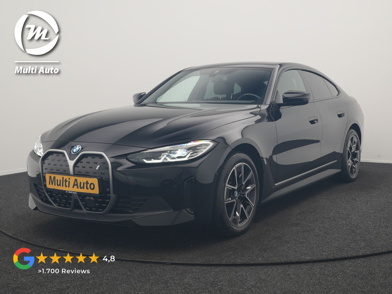 BMW i4 eDrive 35 70 kWh 286pk Dealer O.H | SOH 96,3% | Adaptive Cruise | Camera | Lederen Sportstoelen Verwarmd | Apple Carplay | Keyless | Navigatie | Virtual | DAB | 18"L.M |