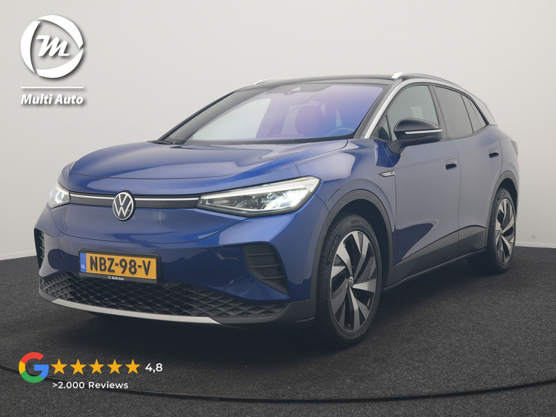 Volkswagen ID.4 First 77 kWh 204pk Dealer O.H. | SOH 91,9% | Trekhaak af Fabriek | Adaptive Cruise | Camera | Warmtepomp | Alcantara Sportstoelen & Stuur Verwarmd | Sfeerverlichting | Apple Carplay | Navigatie | DAB | 20"L.M |